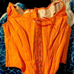 Bright orange steel bone corset
